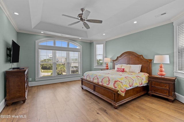 4101 Ocean Dr, Emerald Isle, NC 28594 - bedroom featuring a raised ceiling, wood-type flooring, crown molding, recessed lighting, and ceiling fan