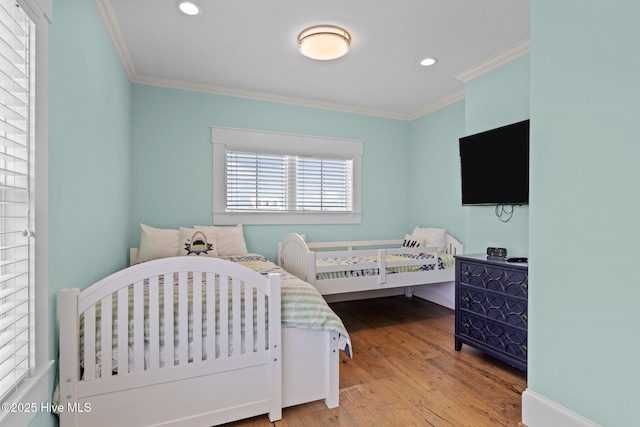 4101 Ocean Dr, Emerald Isle, NC 28594 - bedroom with crown molding, wood finished floors, and recessed lighting