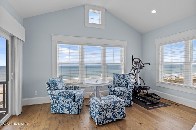 4101 Ocean Dr, Emerald Isle, NC 28594 - sitting room with lofted ceiling and wood finished floors