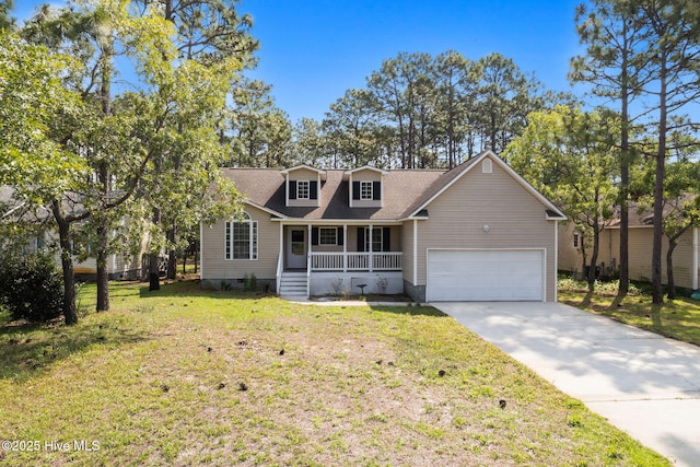 1281 Washington Rd, Southport, NC 28461 - new england style home with a porch, a front yard, driveway, a garage, and roof with shingles