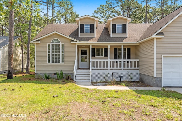 1281 Washington Rd, Southport, NC 28461 - view of front of house featuring a porch, a front yard, and a shingled roof