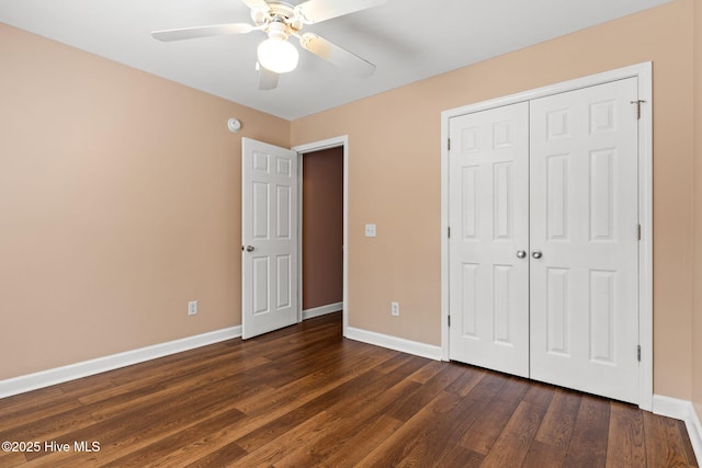 1281 Washington Rd, Southport, NC 28461 - unfurnished bedroom featuring dark wood-style flooring, a closet, and ceiling fan