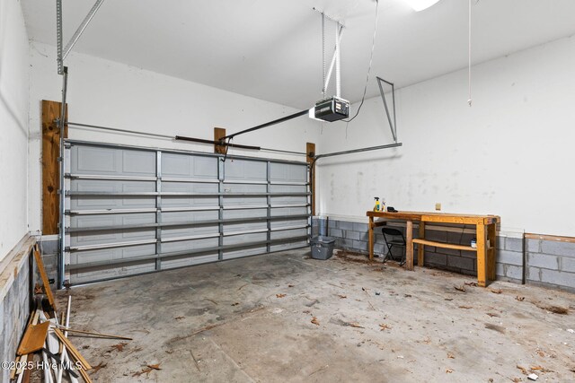 1281 Washington Rd, Southport, NC 28461 - garage featuring a garage door opener
