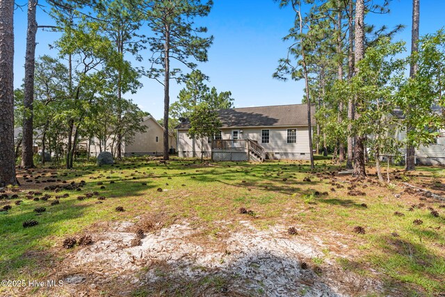 1281 Washington Rd, Southport, NC 28461 - view of yard with a deck