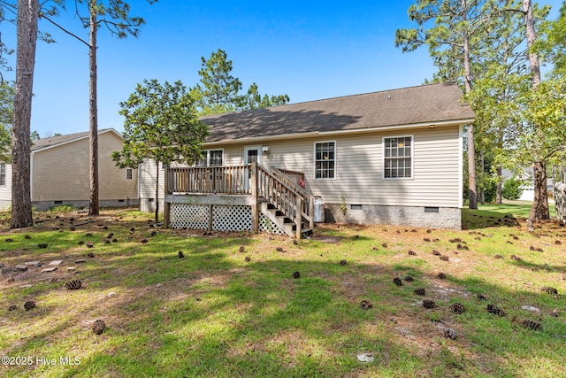 1281 Washington Rd, Southport, NC 28461 - back of property with crawl space, a wooden deck, a yard, and stairs