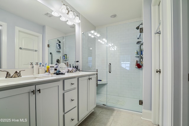 1284 Marsilio Ln SW Unit B, Ocean Isle Beach, NC 28469 - full bath featuring double vanity, a shower stall, and tile patterned flooring
