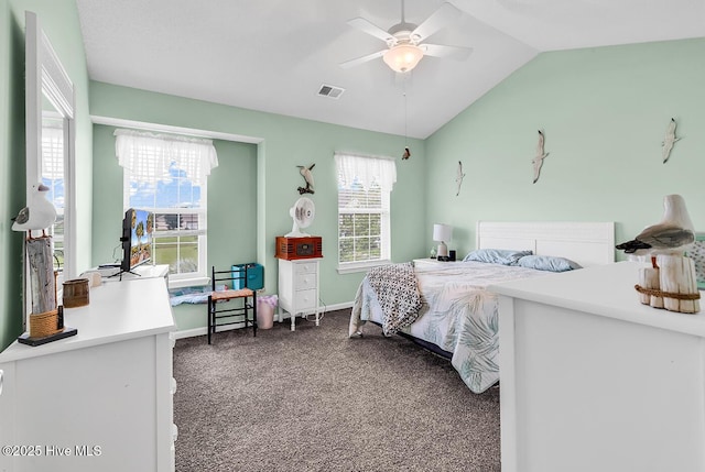 2129 Cass Lake Dr, Calabash, NC 28467 - bedroom with dark colored carpet, vaulted ceiling, and a ceiling fan