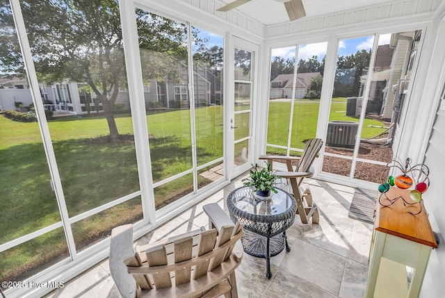 2129 Cass Lake Dr, Calabash, NC 28467 - sunroom featuring a ceiling fan and a residential view