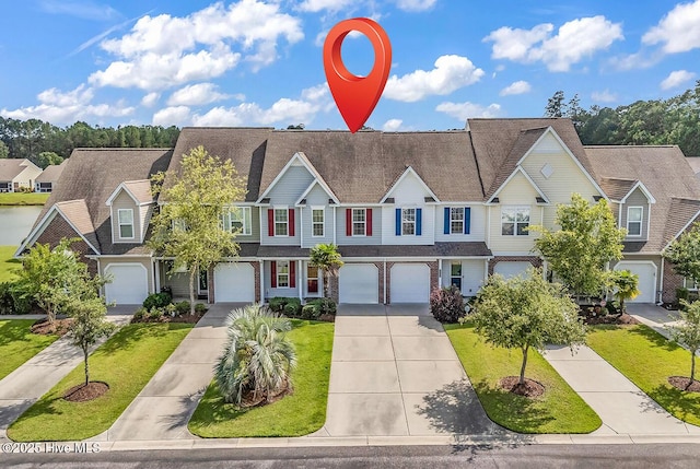 2129 Cass Lake Dr, Calabash, NC 28467 - multi unit property with driveway, a garage, a front yard, and a residential view