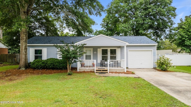 2402 S Lakeview Dr, Newport, NC 28570 - single story home with covered porch, a garage, driveway, and roof with shingles