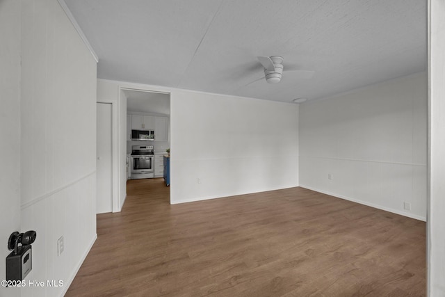 2402 S Lakeview Dr, Newport, NC 28570 - unfurnished room with a ceiling fan, wood finished floors, and ornamental molding