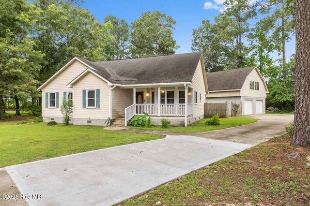 78 Clifford Rd, Red Springs, NC 28377 - view of front of property featuring crawl space, covered porch, an outdoor structure, a front lawn, and roof with shingles