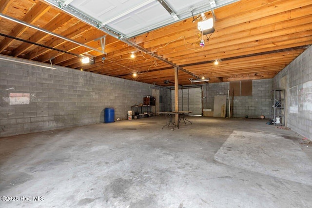 78 Clifford Rd, Red Springs, NC 28377 - garage with concrete block wall and a garage door opener
