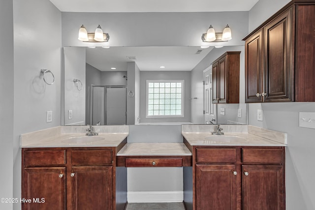 403 Grey Squirrel Ct, Jacksonville, NC 28540 - bathroom with two vanities and a stall shower