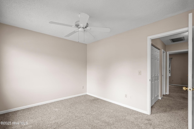 136 Lullwater Dr Unit B, Wilmington, NC 28403 - carpeted spare room featuring a ceiling fan and a textured ceiling