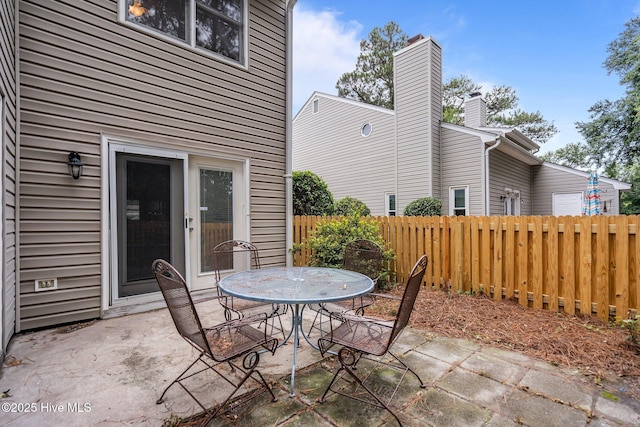 136 Lullwater Dr Unit B, Wilmington, NC 28403 - view of patio with outdoor dining area