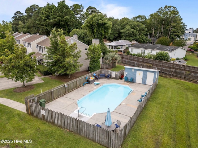 136 Lullwater Dr Unit B, Wilmington, NC 28403 - community pool featuring a residential view, a fenced backyard, and a patio area