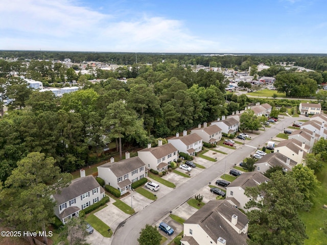 136 Lullwater Dr Unit B, Wilmington, NC 28403 - aerial view of residential area featuring a tree filled landscape