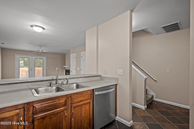 136 Lullwater Dr Unit B, Wilmington, NC 28403 - kitchen with dishwasher, light countertops, ceiling fan, and dark tile patterned floors