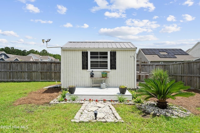 634 Aurora Pl, Hampstead, NC 28443 - view of outdoor structure with a fenced backyard