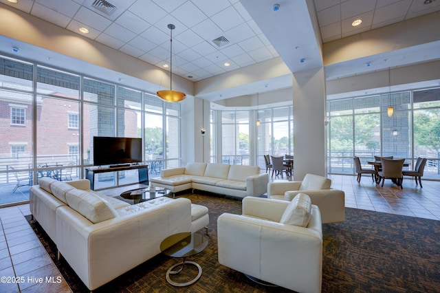 203 Sky Sail Blvd, New Bern, NC 28560 - living area featuring tile patterned flooring and a paneled ceiling