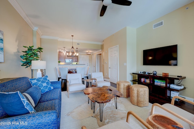 203 Sky Sail Blvd, New Bern, NC 28560 - living area featuring a chandelier, ceiling fan, crown molding, and carpet floors