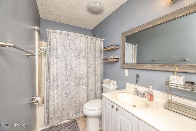 2505 Legend Dr, Wilmington, NC 28405 - full bathroom featuring vanity, tile patterned floors, shower / bath combo with shower curtain, and a textured ceiling