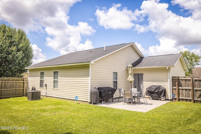 2505 Legend Dr, Wilmington, NC 28405 - rear view of property with a patio, a fenced backyard, and roof with shingles