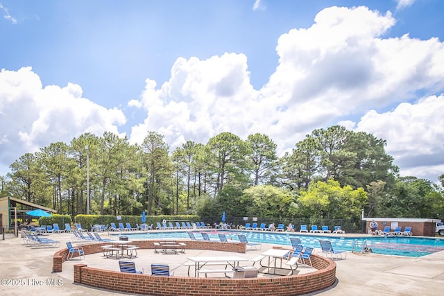 2505 Legend Dr, Wilmington, NC 28405 - community pool featuring view of scattered trees and a patio area
