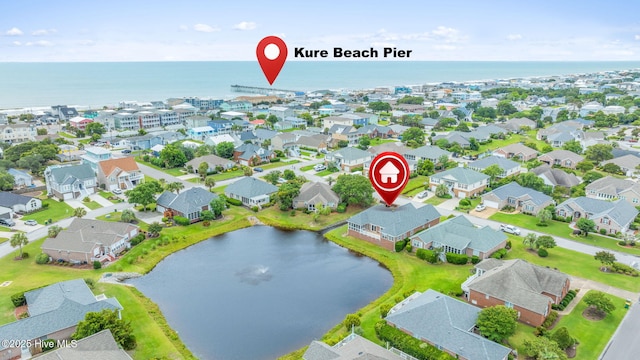 512 Shell Dr, Kure Beach, NC 28449 - aerial view of residential area featuring a large body of water