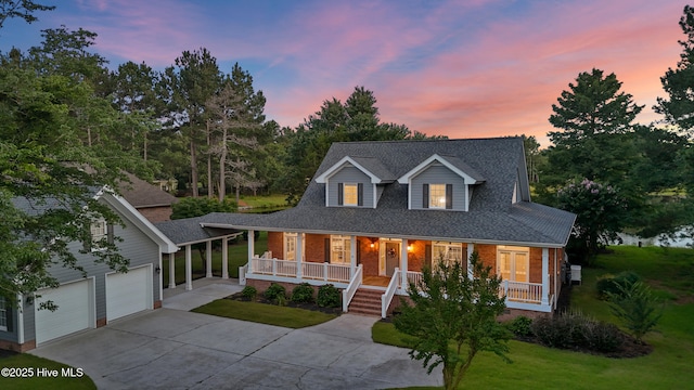 376 Red Fox Run Dr, Wallace, NC 28466 - country-style home featuring covered porch, concrete driveway, brick siding, a front lawn, and a shingled roof