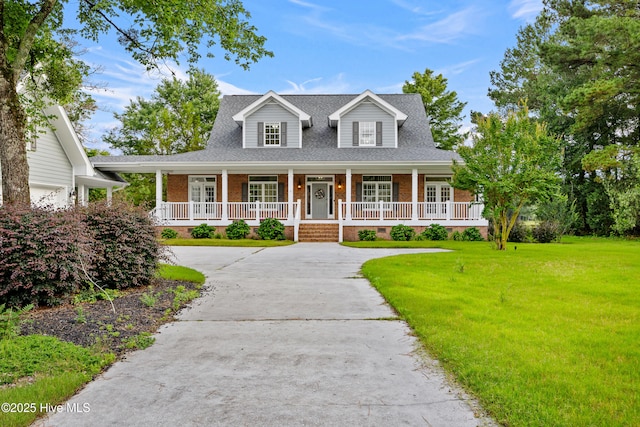 376 Red Fox Run Dr, Wallace, NC 28466 - view of front of property featuring a porch, a front yard, brick siding, and a shingled roof