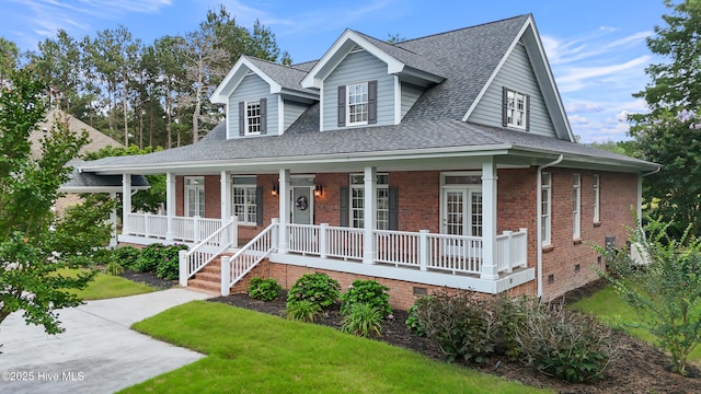 376 Red Fox Run Dr, Wallace, NC 28466 - view of front of house featuring a porch, crawl space, roof with shingles, brick siding, and a front yard