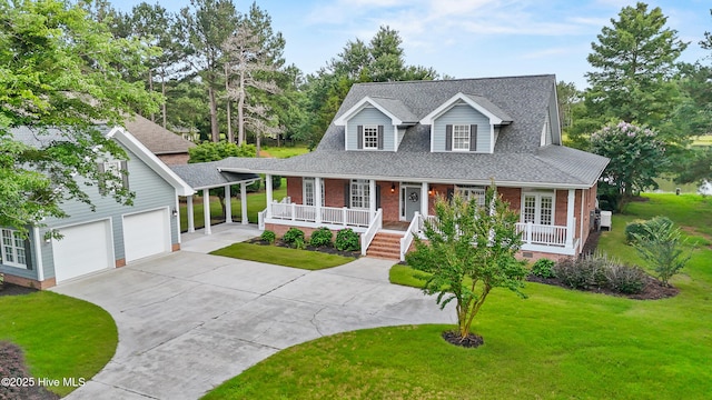 376 Red Fox Run Dr, Wallace, NC 28466 - view of front facade featuring covered porch, a front yard, driveway, brick siding, and roof with shingles