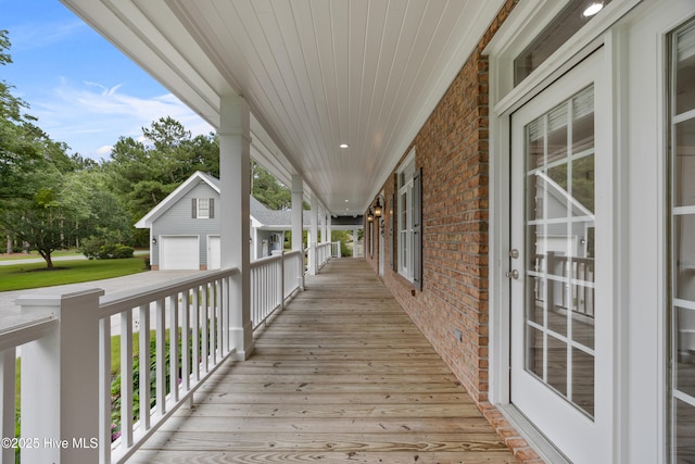 376 Red Fox Run Dr, Wallace, NC 28466 - porch featuring a detached garage and an outbuilding