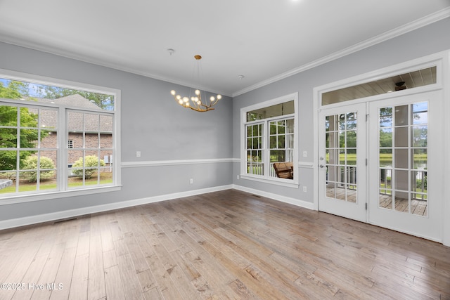 376 Red Fox Run Dr, Wallace, NC 28466 - unfurnished dining area featuring a chandelier, wood-type flooring, and ornamental molding