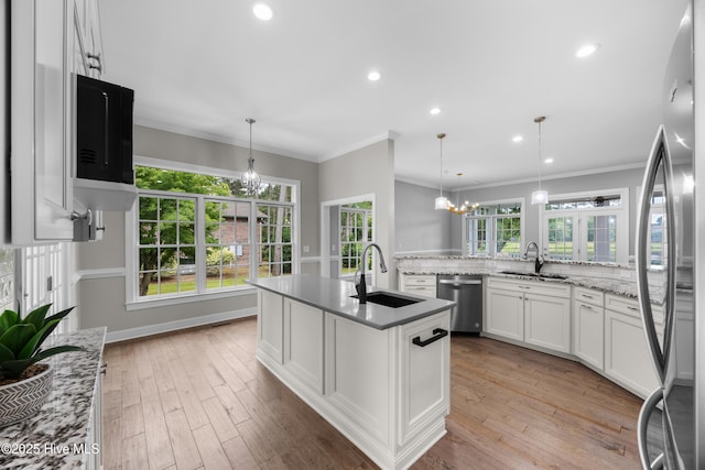 376 Red Fox Run Dr, Wallace, NC 28466 - kitchen with a chandelier, appliances with stainless steel finishes, crown molding, white cabinets, and light wood-style floors