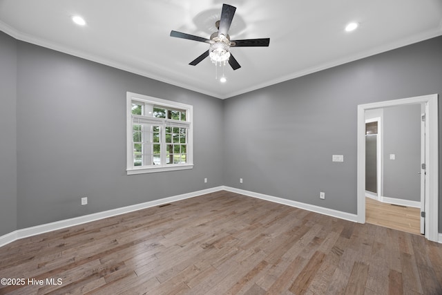 376 Red Fox Run Dr, Wallace, NC 28466 - spare room with crown molding, wood finished floors, ceiling fan, and recessed lighting
