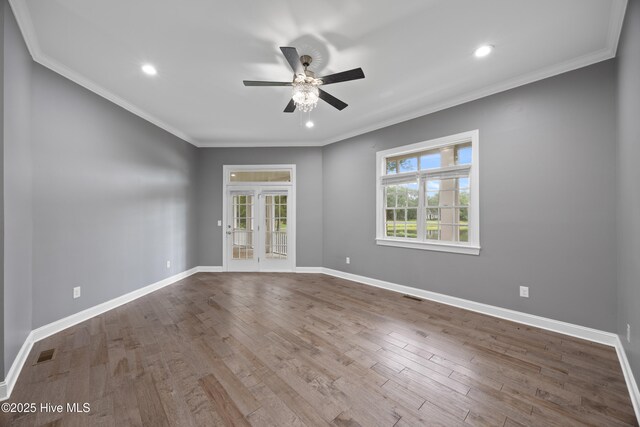 376 Red Fox Run Dr, Wallace, NC 28466 - spare room with ceiling fan, wood finished floors, ornamental molding, and recessed lighting