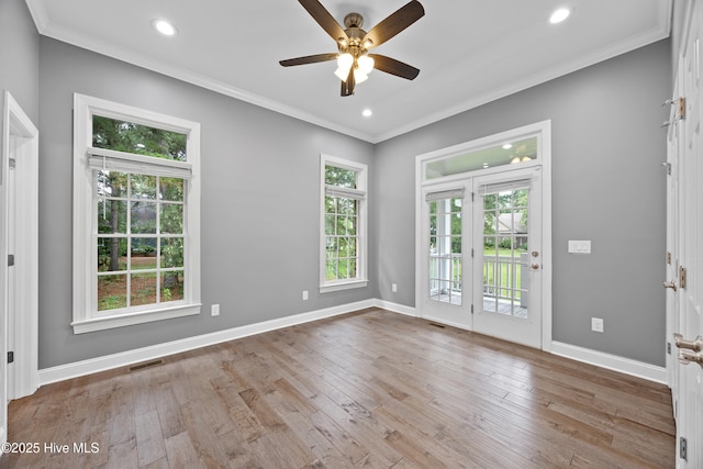 376 Red Fox Run Dr, Wallace, NC 28466 - spare room with crown molding, a ceiling fan, wood-type flooring, and recessed lighting