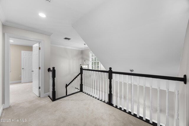 376 Red Fox Run Dr, Wallace, NC 28466 - hall with an upstairs landing, carpet flooring, crown molding, and recessed lighting