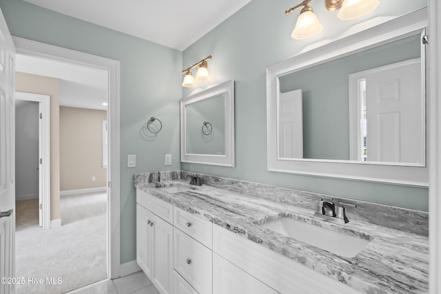 376 Red Fox Run Dr, Wallace, NC 28466 - bathroom featuring double vanity and baseboards