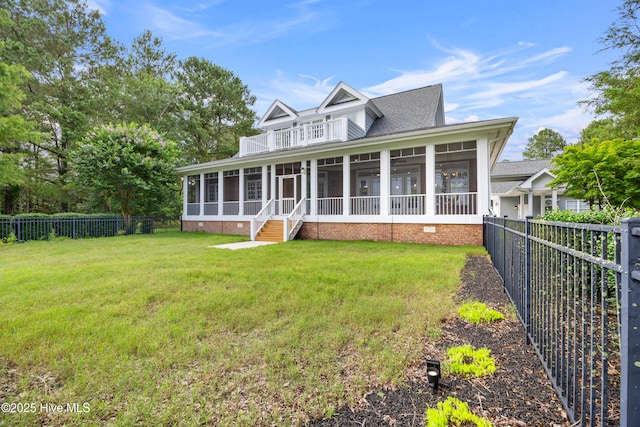 376 Red Fox Run Dr, Wallace, NC 28466 - back of house featuring a sunroom, crawl space, a fenced backyard, and a shingled roof