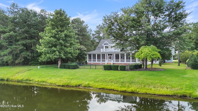 376 Red Fox Run Dr, Wallace, NC 28466 - rear view of house with a sunroom and a water view
