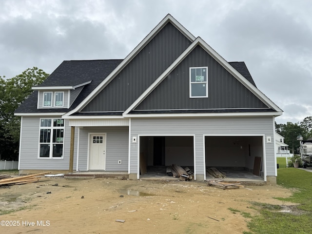 305 Duck Hvn, Swansboro, NC 28584 - view of front of property with a garage and roof with shingles