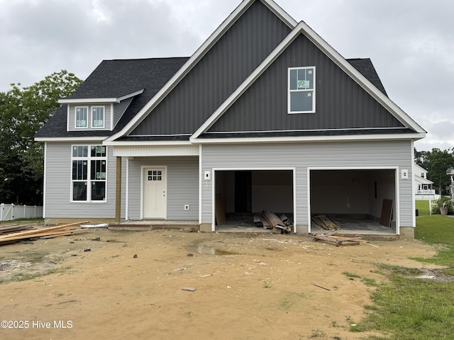 305 Duck Hvn, Swansboro, NC 28584 - view of front of house featuring a shingled roof and board and batten siding