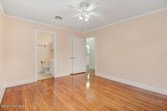 102 SE Third St, Snow Hill, NC 28580 - unfurnished bedroom with ornamental molding, light wood-style flooring, ensuite bathroom, and ceiling fan
