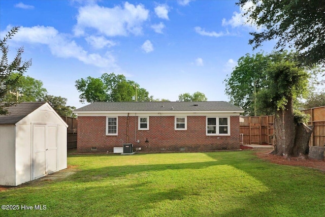 102 SE Third St, Snow Hill, NC 28580 - back of house with crawl space, a storage shed, and brick siding
