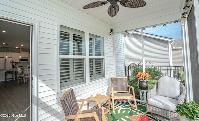 9363 Eagle Ridge Dr, Calabash, NC 28467 - sunroom / solarium featuring a ceiling fan
