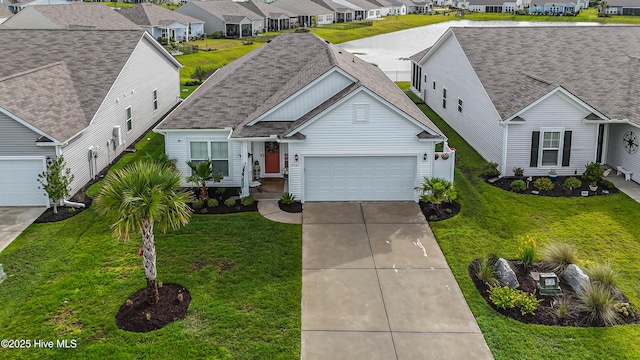 9363 Eagle Ridge Dr, Calabash, NC 28467 - traditional-style house featuring a residential view, concrete driveway, an attached garage, and a front yard